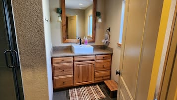 Shower, towels, soap, toilet paper