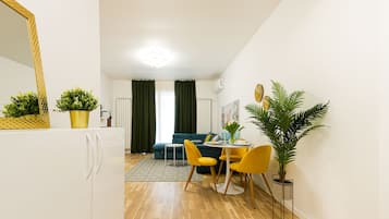 Premium Apartment | Living area | 55-cm Smart TV with cable channels, Netflix, streaming services