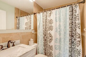 Hair dryer, towels, soap, shampoo