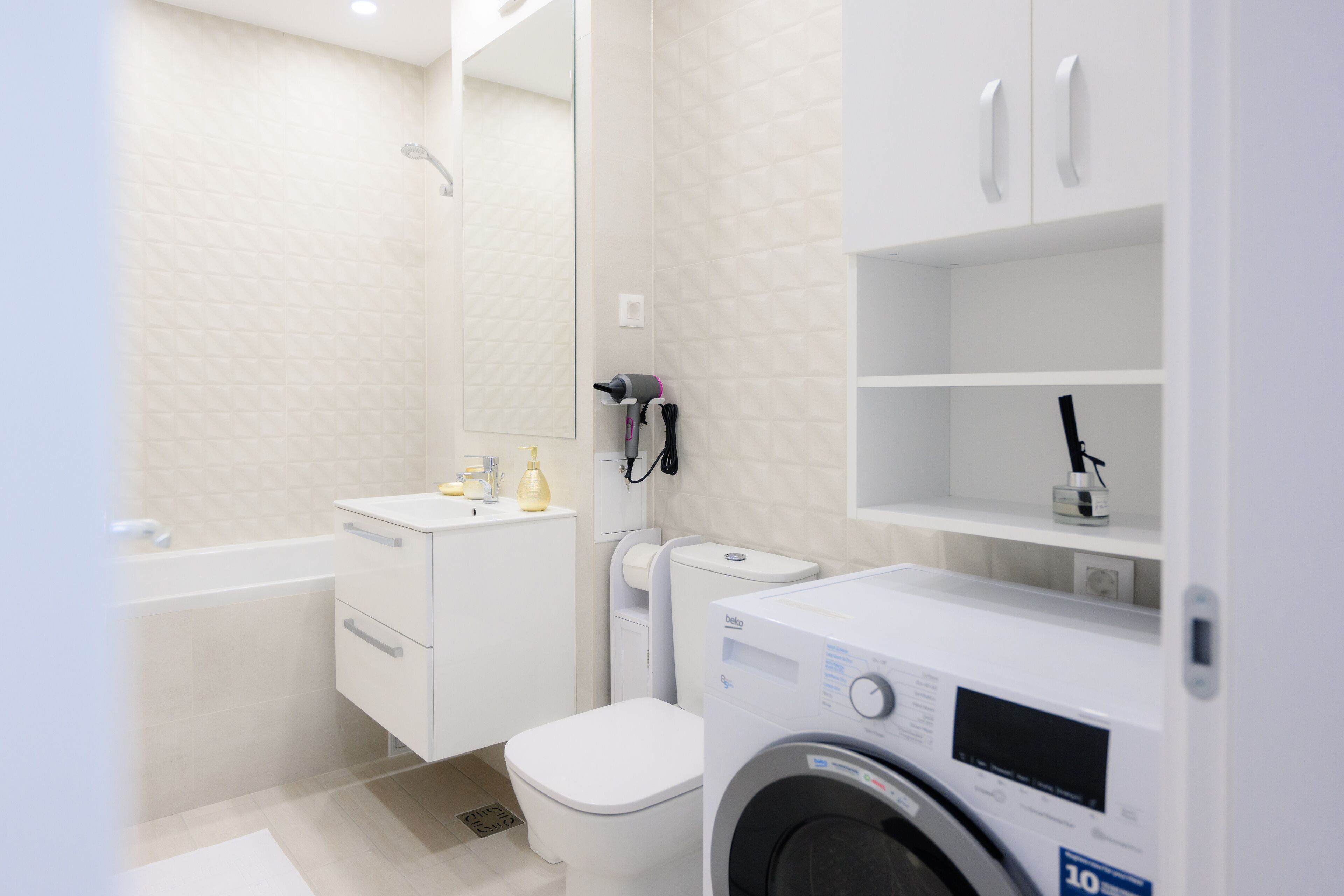 Hair dryer, towels, soap, shampoo