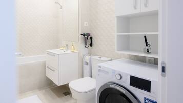Hair dryer, towels, soap, shampoo