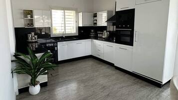 Fridge, microwave, oven, cookware/dishes/utensils