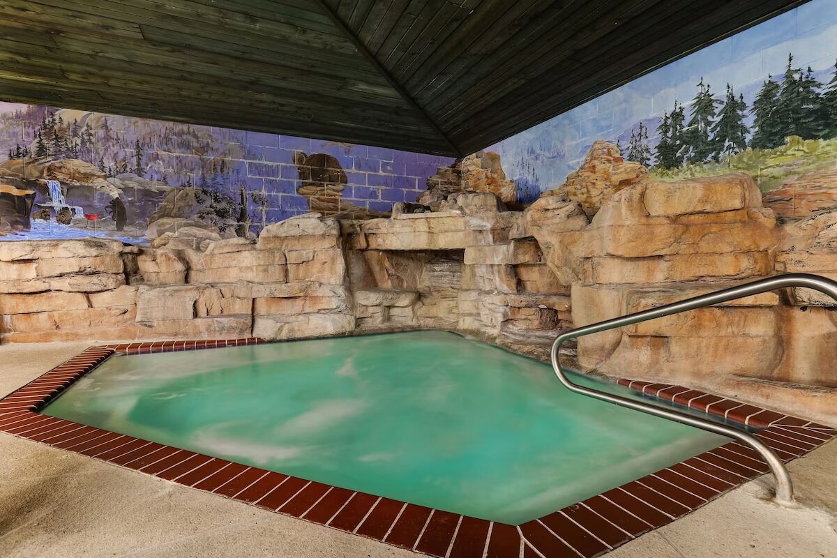 Soak away the day in a steamy, cave-style hot tub.
