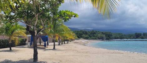 On the beach, beach towels