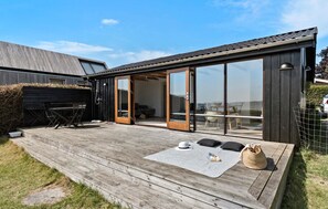 Outdoor dining - 2 bedroom beach front home in Rønde (Rønde)