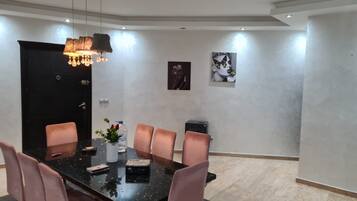 Classic Apartment | Living area | Flat-screen TV