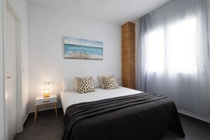 1 dormitorio, tabla de planchar con plancha, wifi gratis y ropa de cama