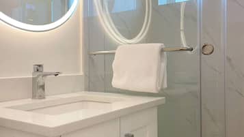 Shower, towels, soap, shampoo