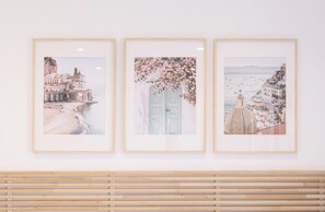 Three framed artworks on a wall. - Modern Family Apt in Sorrento with Views (Sorrento)