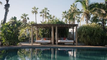 Outdoor pool, open 7:00 AM to 8:00 PM, free cabanas, pool umbrellas