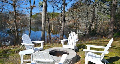 3 bedroom 2 bath Renovated Ranch with Pond Views on peaceful private 1.5 acre lot in North Falmouth