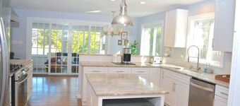3 bedroom 2 bath Renovated Ranch with Pond Views on peaceful private 1.5 acre lot in North Falmouth