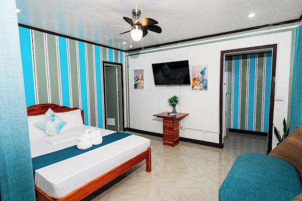 Quarto luxo, vista para o jardim | Roupas de cama premium, individualmente mobiliados, Wi-Fi de cortesia