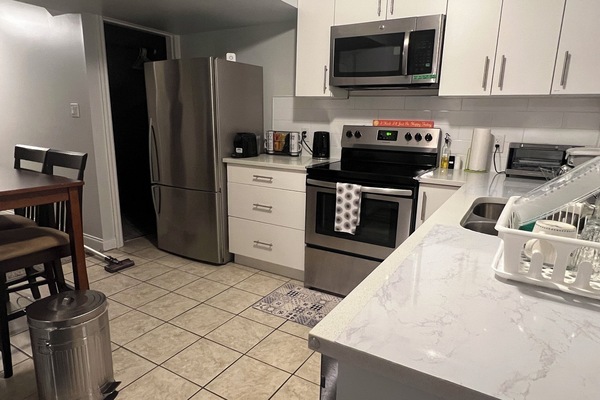 Coffee/tea maker, fridge, microwave, oven