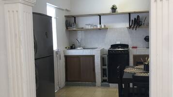 Fridge, microwave, stovetop, coffee/tea maker