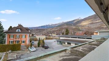 A residential area with a view of a mountain range.