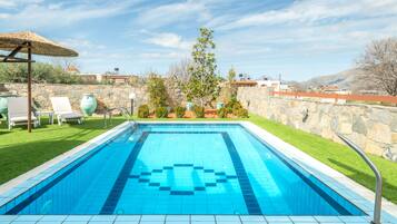 Seasonal outdoor pool, open 8:00 AM to 8:00 PM, pool umbrellas