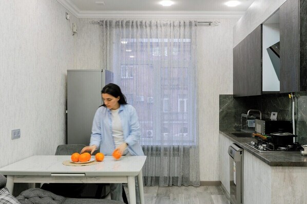 Fridge, microwave, stovetop, high chair