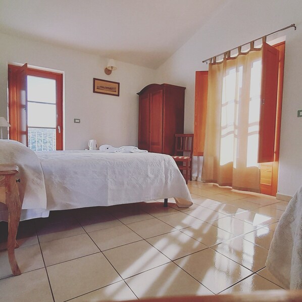 Chambre Confort Double ou avec lits jumeaux, 1 lit double, vue jardin