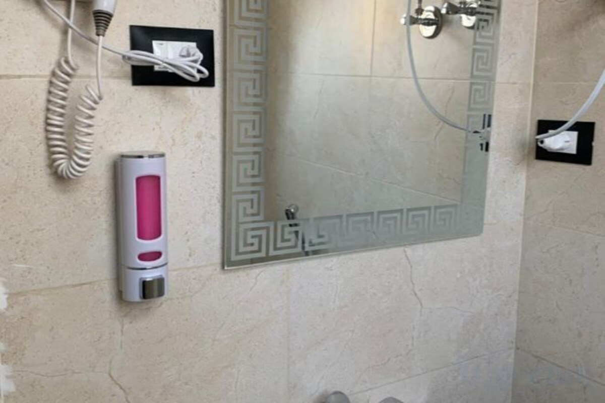 Bathroom | Rainfall showerhead, free toiletries, hair dryer, bathrobes