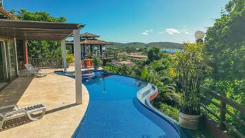 Outdoor pool, open 6:00 AM to 8:00 PM, pool umbrellas, pool loungers