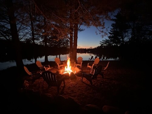 1/2 acre, 450 feet of lake frontage and a sandy beach with sunsets! 