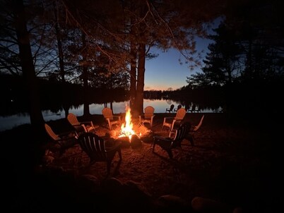 1/2 acre, 450 feet of lake frontage and a sandy beach with sunsets! 