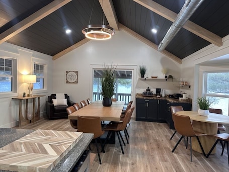 Dining. 1/2 acre, 450 feet of lake frontage and a sandy beach with sunsets!