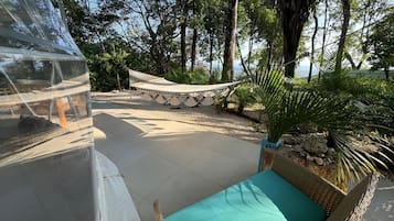Exclusive Tent, Patio, Ocean View | Living area | 32-inch LCD TV with digital channels, Netflix, streaming services