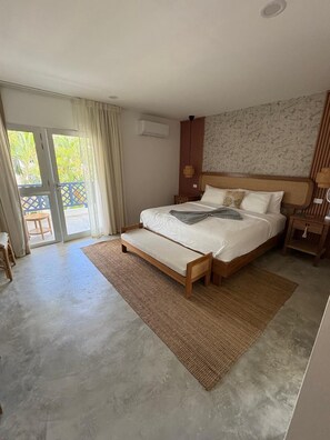 Suite, Pool View | Pillowtop beds, minibar, in-room safe, blackout drapes - Empyrean Portillo Wellness (Las Terrenas)