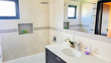 Shower, hair dryer, towels, soap