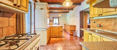 Microwave, oven, high chair, dining tables