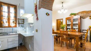 Microwave, toaster, highchair, dining tables