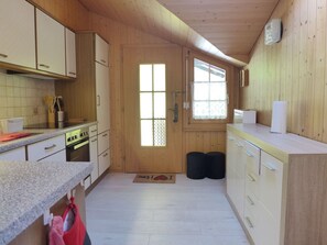 Oven, toaster, dining tables