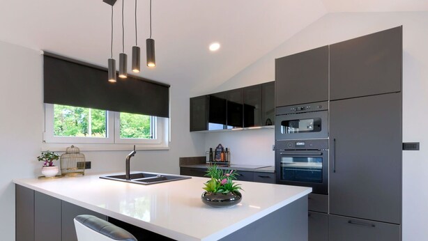 A modern kitchen with a central island, dark cabinetry, stainless steel appliances, and pendant lighting. - Wonderful  villa for 6 people with private pool, A/C, WIFI, TV and terrace (Pazin)