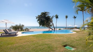 Outdoor pool, pool umbrellas, pool loungers