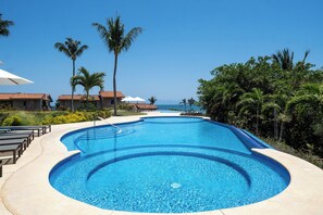 Outdoor pool, pool umbrellas, sun loungers
