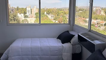 2 quartos, ferros/tábuas de passar roupa, Wi-Fi, roupa de cama