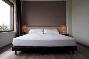 Habitación estándar doble | Sábanas de algodón egipcio y ropa de cama de alta calidad