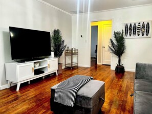 Living area - Stylish Comfy Bungalow- 10 minutes to the beach. Backyard w/ deck & Grill.  (West Palm Beach)