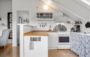 Fridge, stovetop, coffee/tea maker, cookware/dishes/utensils