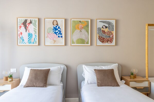 3 habitaciones, tabla de planchar con plancha, wifi y ropa de cama