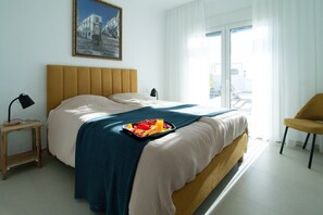 4 عدّة غرف نوم ومكواة/لوح كي وواي فاي مجانًا وملاءات أسرّة