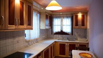 Réfrigérateur, plaque de cuisson, cafetiÚre/bouilloire