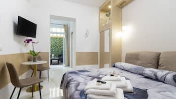 Een strijkplank/strijkijzer, gratis wifi, beddengoed