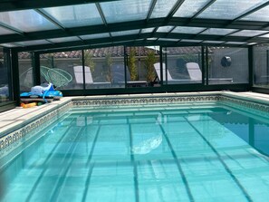 Lämmitetty uima-allas