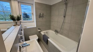 Hair dryer, towels, soap, shampoo