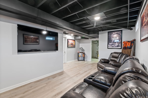 Basement with 65" TV.