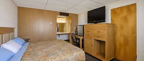 Habitación, 1 cama King size | Escritorio, wifi gratis y ropa de cama
