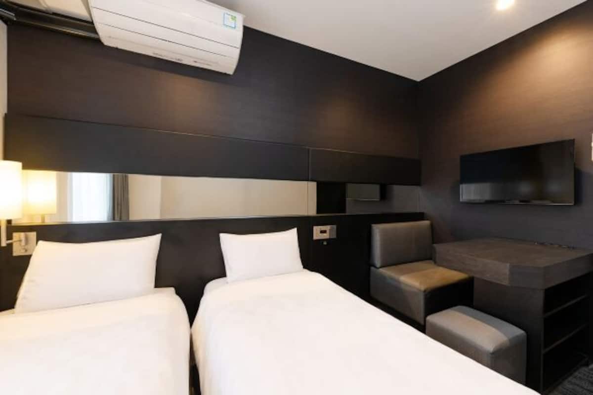 Desk, free WiFi, bed sheets